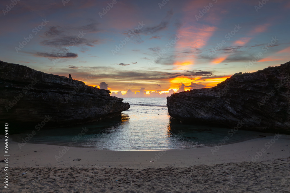 View of sunrise at Anse Bouteille located on the west coast of Rodrigues island	