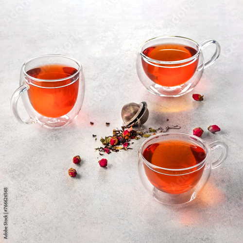 flower tea in a glass cups. On a white background. Tea concept. © Elena Elizarova
