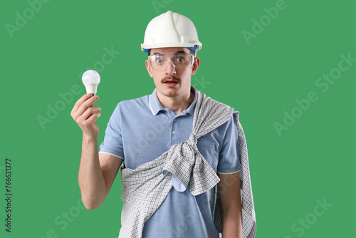 Shocked male worker with li...