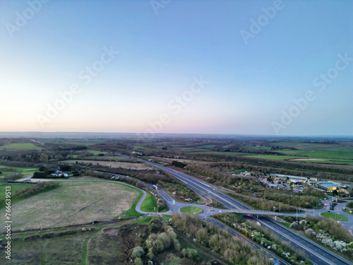 High Angle View of British Countryside and Village of Oxford Near M40 Motorways During Sunrise, England UK