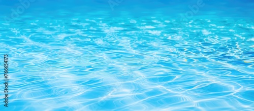 A close-up view of a pool reflecting clear blue skies and surrounded by a peaceful atmosphere © TheWaterMeloonProjec