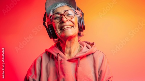 Portrait of a hipster woman listening to music against a colorful background