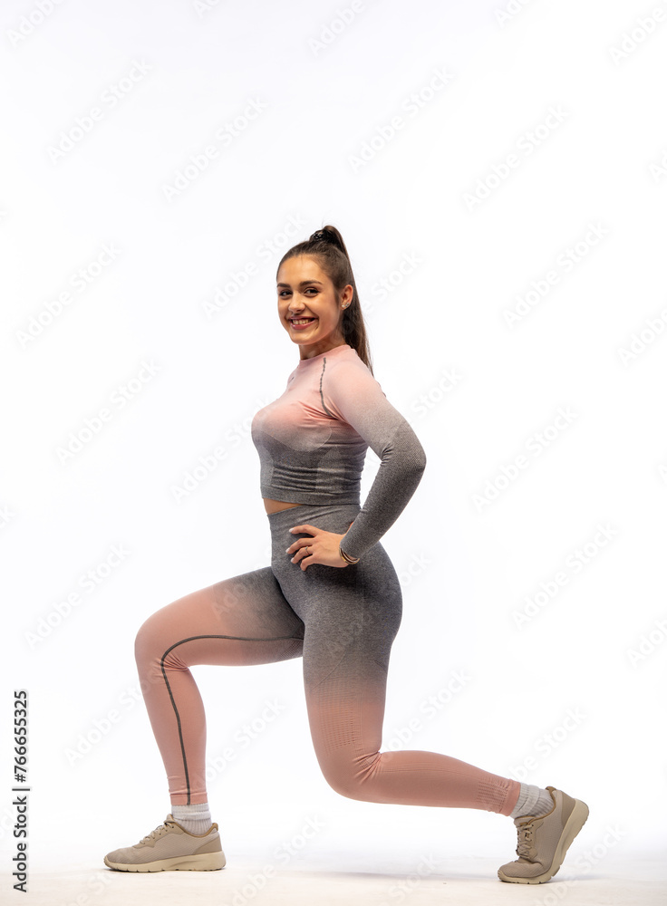 smiling body positive woman performing fitness exercises in full body isolated smiling body positive woman performing fitness exercises in full body isolated