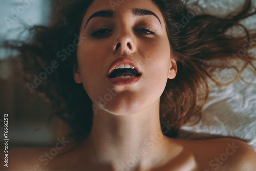 woman is in bed and has str...