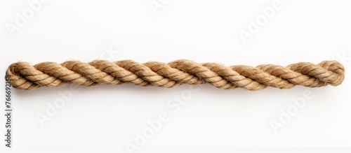 A closeup shot of a metal rope fashion accessory with intricate knot patterns on a white background. Perfect for events or as jewelry