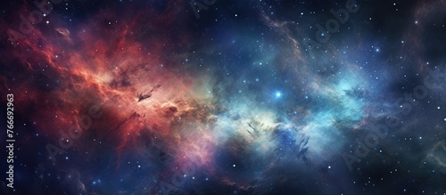A vibrant nebula filled with colorful stars, set against a serene blue nebula background