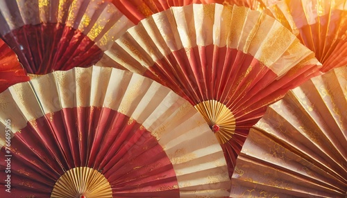 red and gold paper fan chinese decoration background for lunar new year concept