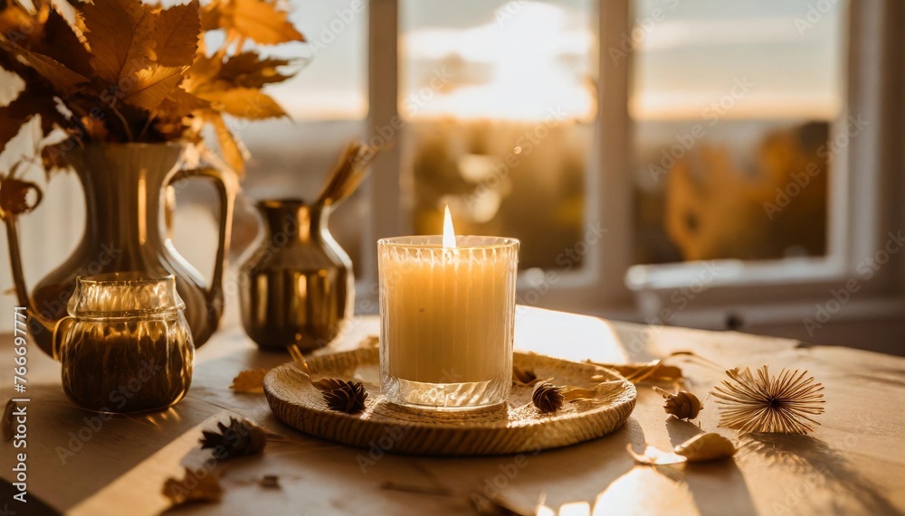 burning candle in home interior autumn aesthetics