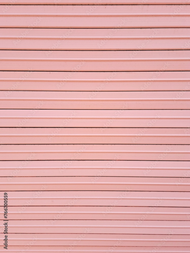 Pink color striped wall background Pink color striped wall background