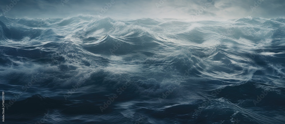 A serene and expansive view of a large body of water with gentle waves moving across its surface