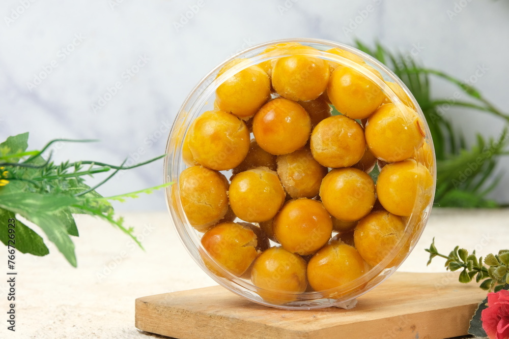 Pineapple tart or nanas tart or nastar cookies. cookies with pineapple jam inside on bright mood Pineapple tart or nanas tart or nastar cookies. cookies with pineapple jam inside on bright mood