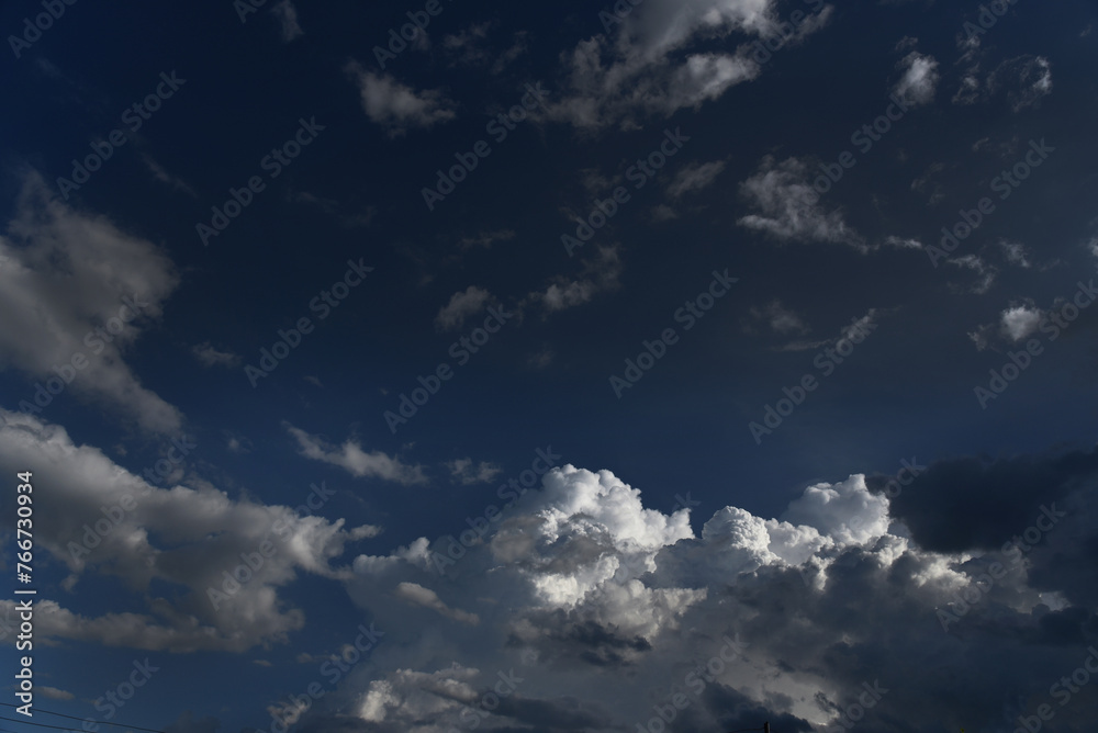 Dramatic dark storm thundercloud rain clouds on black sky background. Dark thunderstorm clouds rainny landscape. Meteorology danger windstorm disaster climate. Dark cloudscape storm disaster gray sky