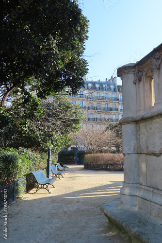 paris, houses and park with benches and lanterns
