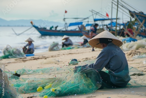 Vietnamese fishermen in conical hats repairing their fishing nets on a sandy beach, with fishing boats anchored in the background, Generative AI