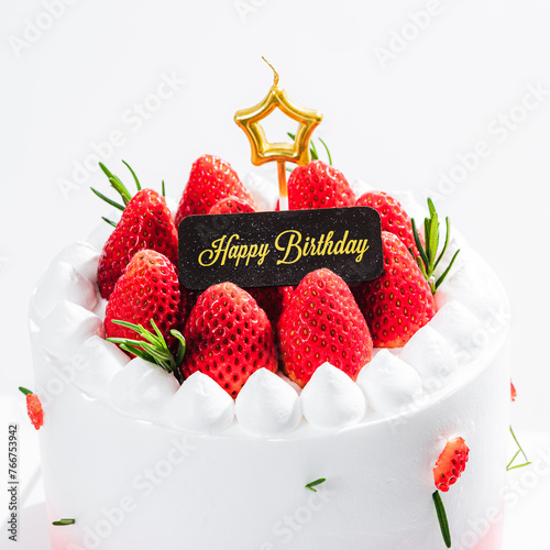 Delicious birthday cake with fresh strawberries, on wooden table and white background. Free space for your text. © Hide_Studio