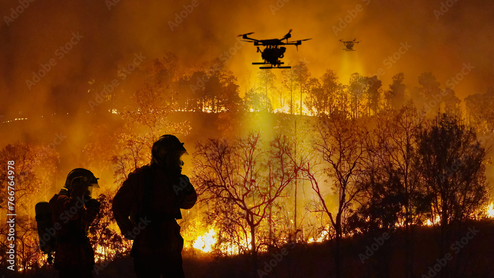 Firefighting drones spray chemical to help control wildfires. - obrazy, fototapety, plakaty 