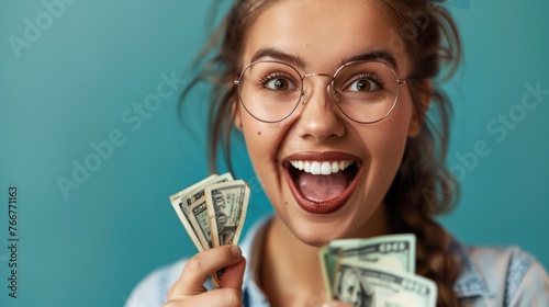 Young attractive beautiful female entrepreneur fund borrower crazy joyful ecstatic face gesture hand yes feeling amazed in peer to peer P2P lending finance or crowdfunding network microfinance approve photo
