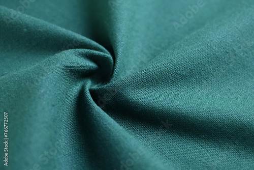 deep green color texture of fabric textile, abstract image for fashion cloth design background
