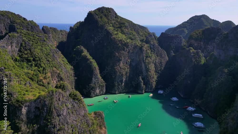 boats in lagoon bay limestone mountains. Best aerial top view flight tilt down drone
4k boats in lagoon bay limestone mountains. Best aerial top view flight tilt down drone
4k