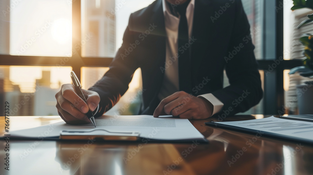A dapper man in a tailored suit sits at a desk, pen in hand, meticulously writing on a blank piece of paper with a look of intense concentration, business concept A dapper man in a tailored suit sits at a desk, pen in hand, meticulously writing on a blank piece of paper with a look of intense concentration, business concept
