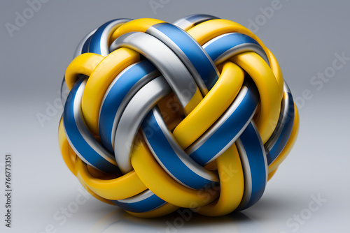 abstract geometric composition, yellow and blue rings. bunch of twisted yellow and blue rubber bands. multicolored rubber bands twisted in a loop photo