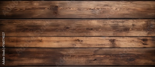 Detailed view of a wooden wall with a rich brown stain, showing texture and color variations