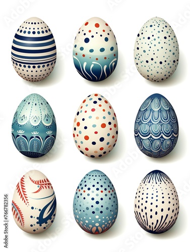 A set of painted eggs with blue and white designs