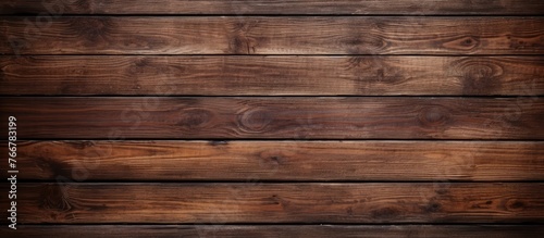 Detailed view of a wooden wall showing a dark brown staining, adding warmth and character to the surface