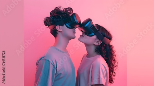virtual closeness: a couple in VR headsets share an almost kiss against a pink background photo