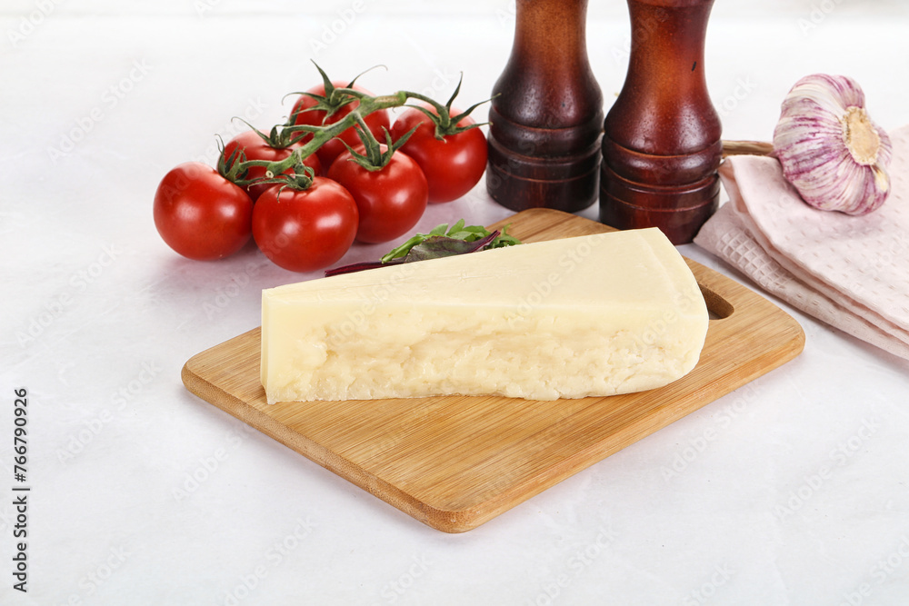 Piece Italian hard parmesan cheese Piece Italian hard parmesan cheese