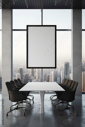 A contemporary black and white meeting room with a city skyline view and a blank white empty frame.