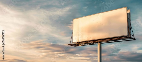 A vast empty advertising board designed for outdoor promotion. photo