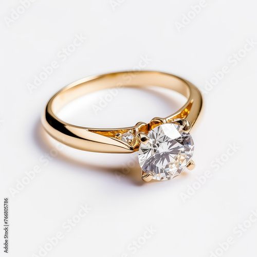 A gold ring with a diamond in the center