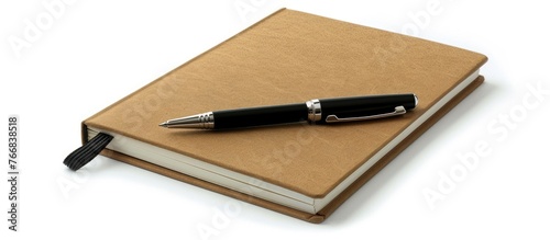 Design idea - Overhead perspective of a hardcover kraft notebook and ballpoint pen isolated on a white background for a mockup.