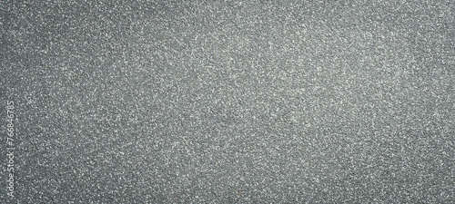 Gray sand background. Textured sand surface.