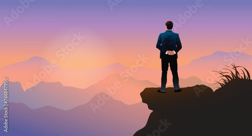 Businessman standing and looking forward on against sunset in sky feeling free . Freedom and calm concept