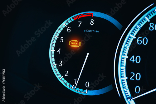 Engine malfunction warning light or Check engine light illuminated on instrument panel in a car , Car repair concept photo