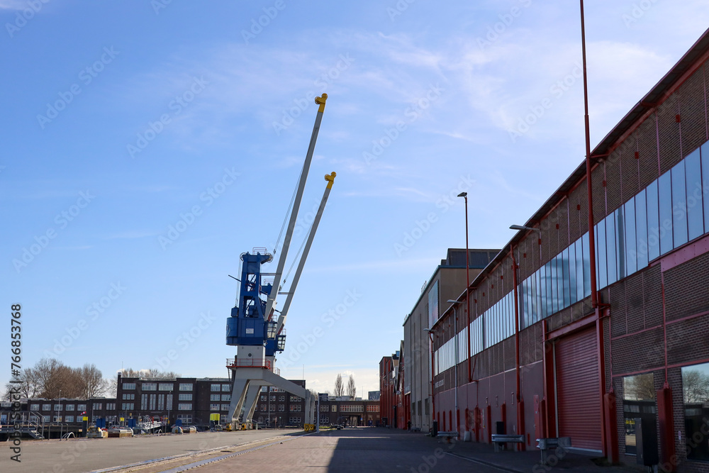 Cranes at dock in Heijplaat harbor of the Port of Rotterdam Cranes at dock in Heijplaat harbor of the Port of Rotterdam