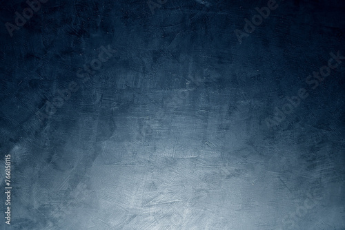 Ombre midnight blue concrete wall background.