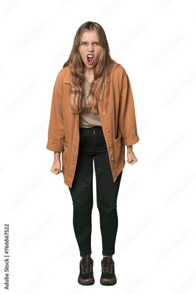 Studio portrait of a blonde Caucasian woman shouting very angry, rage concept, frustrated. Studio portrait of a blonde Caucasian woman shouting very angry, rage concept, frustrated.