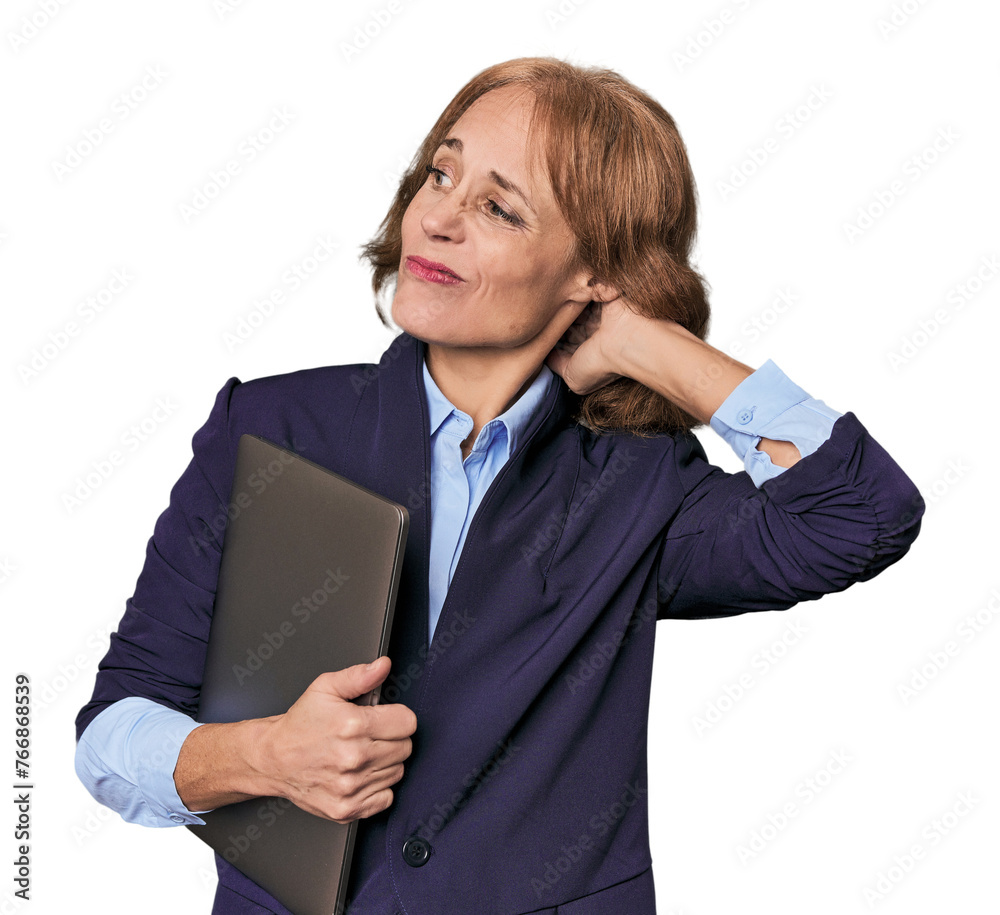 Mid-aged Caucasian with laptop in studio touching back of head, thinking and making a choice. Mid-aged Caucasian with laptop in studio touching back of head, thinking and making a choice.