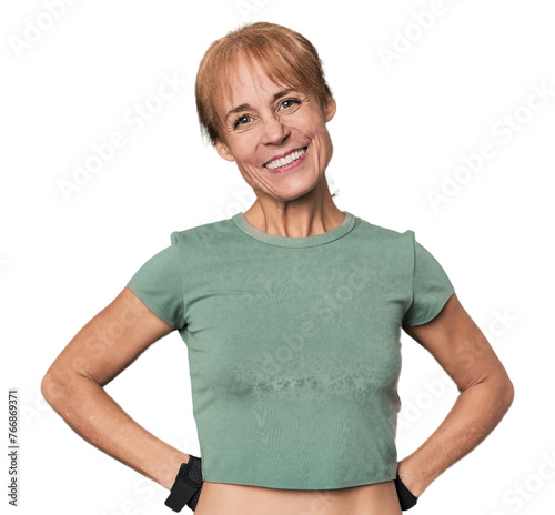 Mid-aged Caucasian athlete with gloves happy, smiling and cheerful.