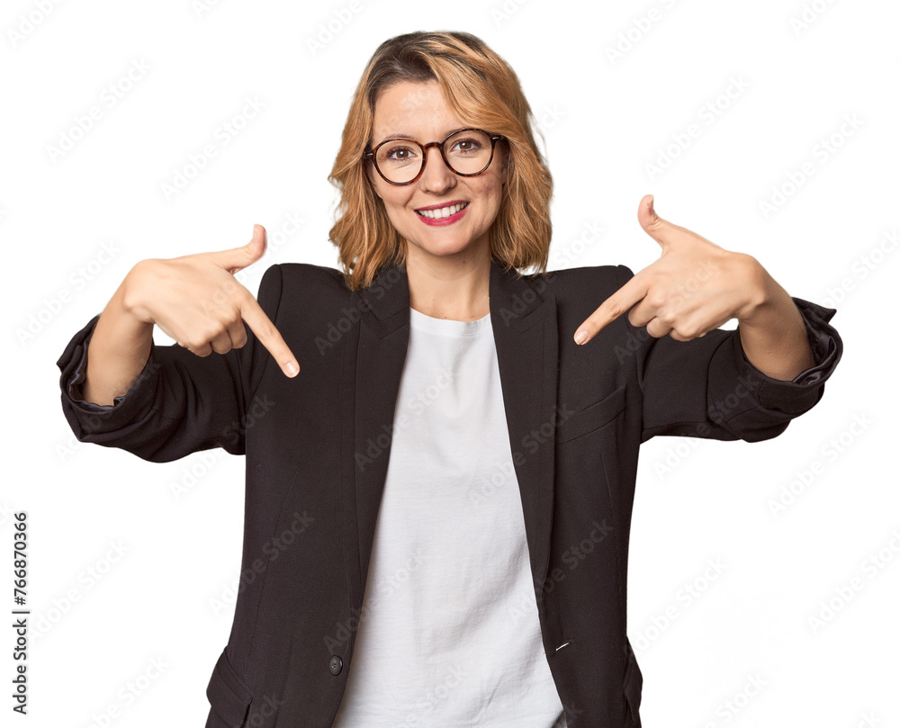 Caucasian woman in black business suit points down with fingers, positive feeling. Caucasian woman in black business suit points down with fingers, positive feeling.