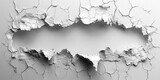 A large hole with a lot of cracks in a wall with a white background