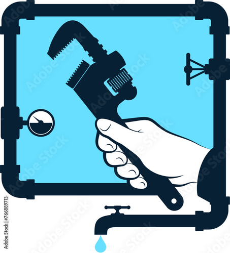 A plumbing key in the hand of a plumber. Symbol of plumbing repair and service