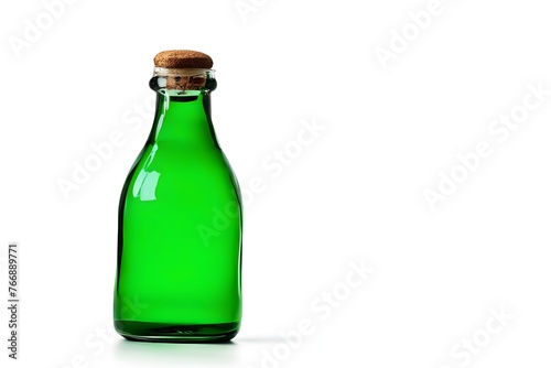 Glass green bottle on a white background