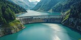 Alpine water storage and power source in Switzerland promoting clean and renewable electricity to combat climate change seen from above in summer.