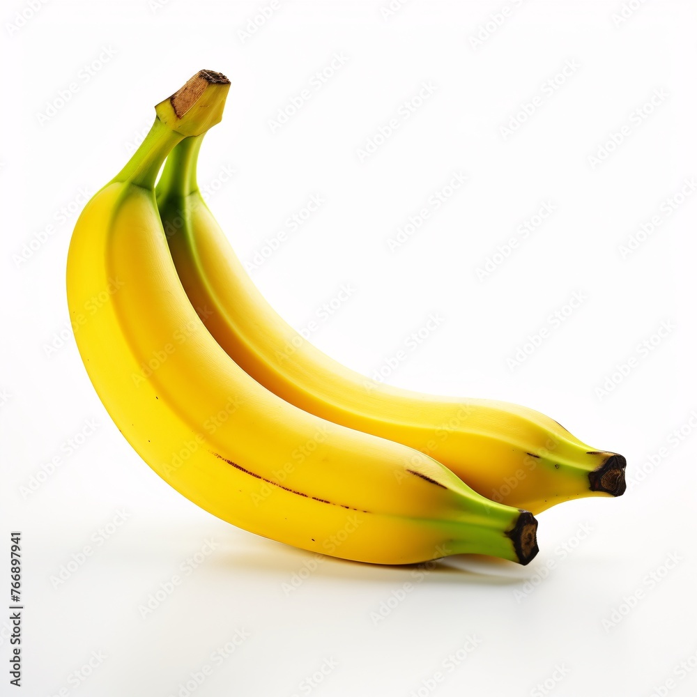 A ripe yellow banana placed on a pure white background