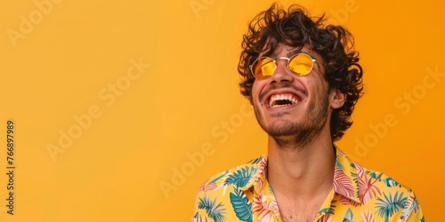Joyful South American Man Laughing on Orange