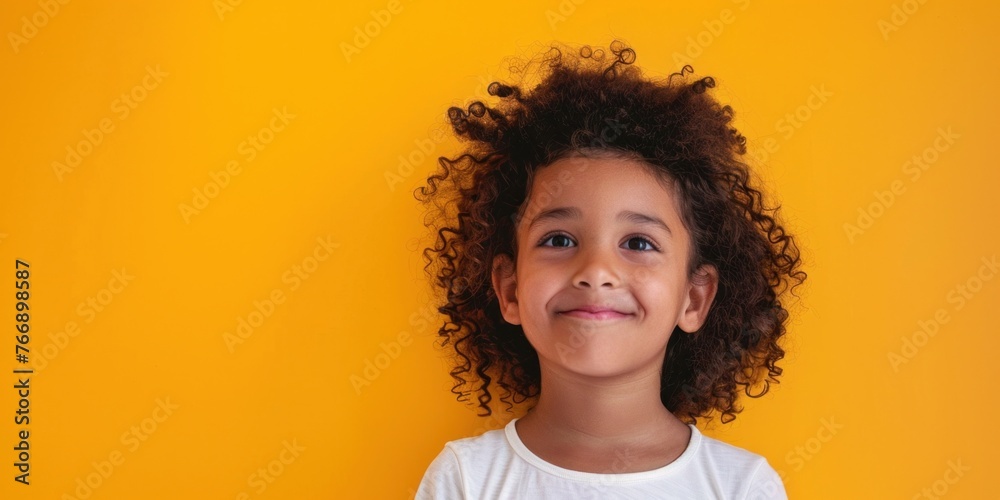 South American Child on Yellow Background - obrazy, fototapety, plakaty 